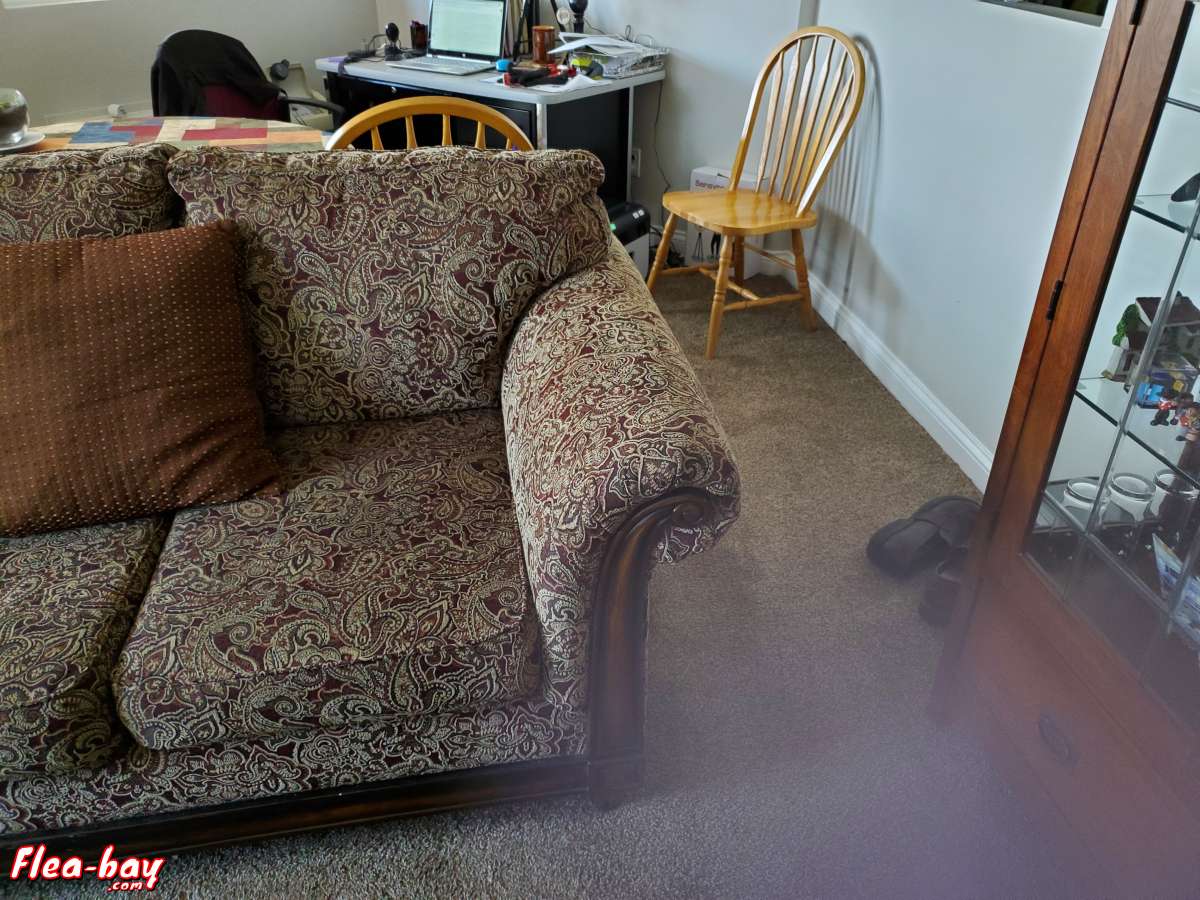 Sofa, 90 "good condition,  dark green, deep red fabric,