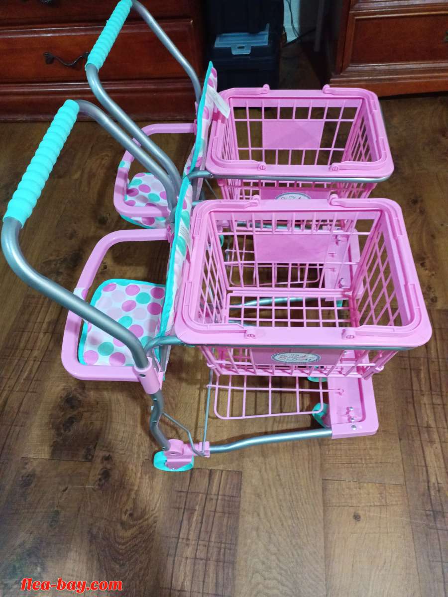 two little girl portable shopping baskets