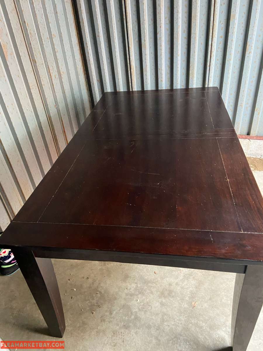 Brown Big Table with Four Chairs