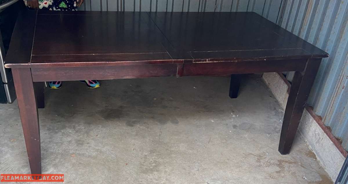 Brown Big Table with Four Chairs