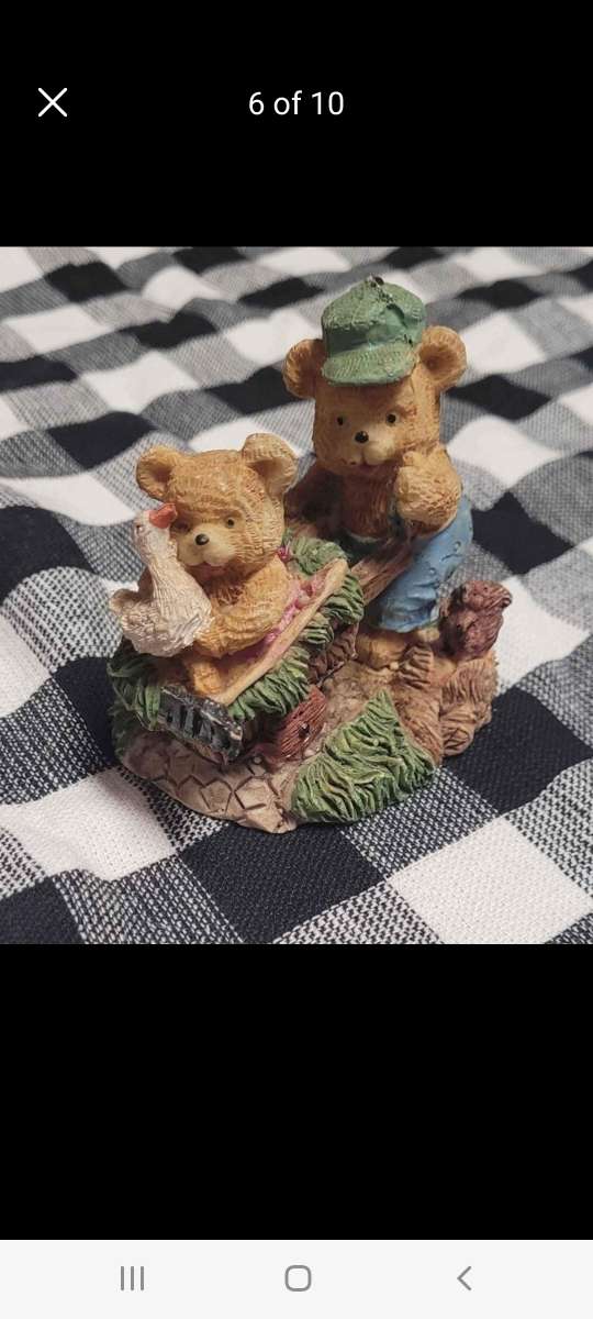 Lots of bear figurines for sale