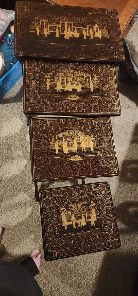 1910 lacquered nesting tables with gold inlay