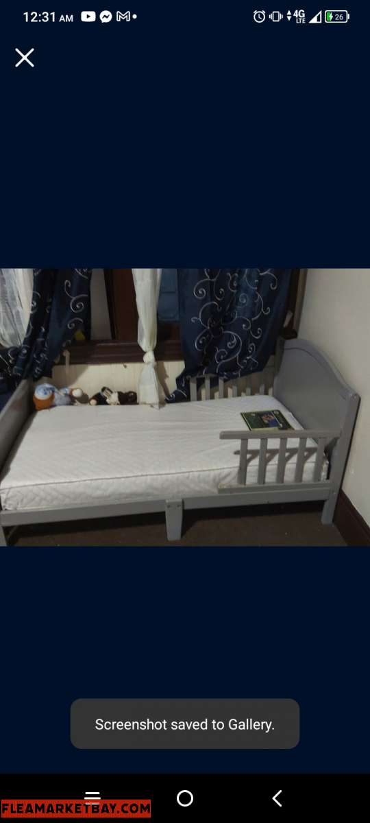 toddler bed frame with mattress.