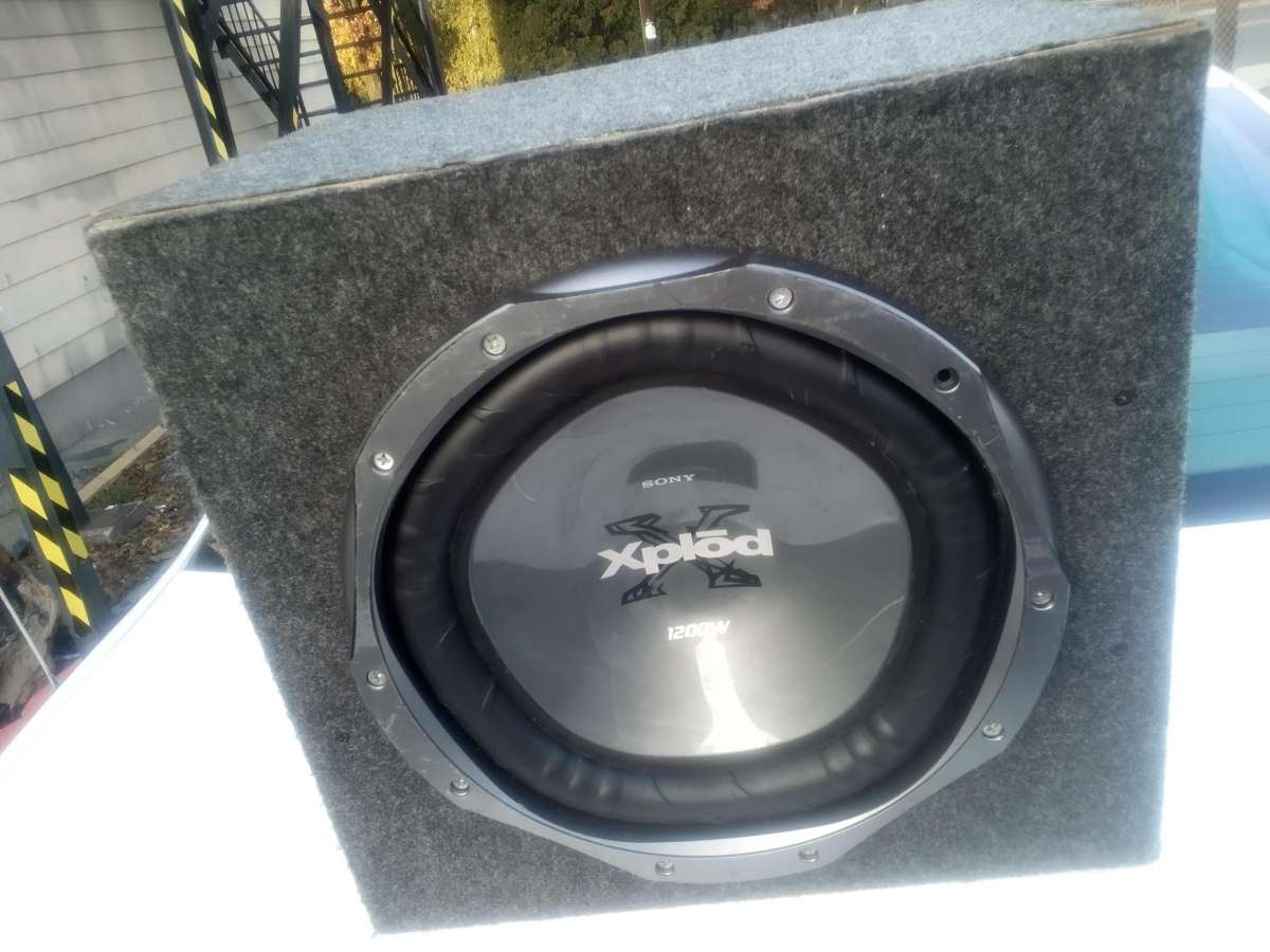 sony Xplod 1200 watt subwoofer speaker and cabinate .