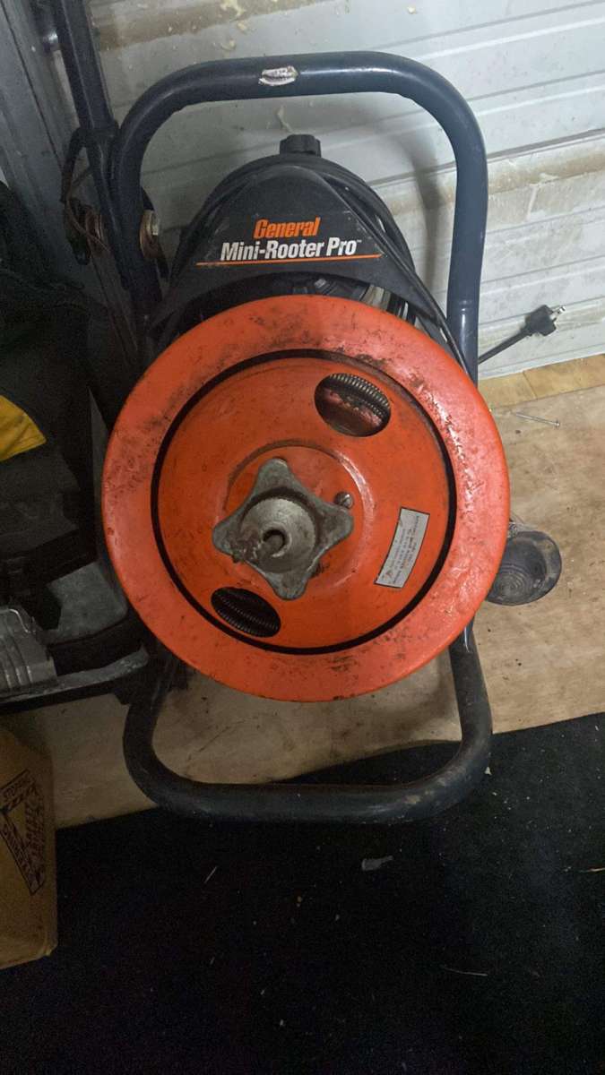 Three RotoRooter machines two small one big