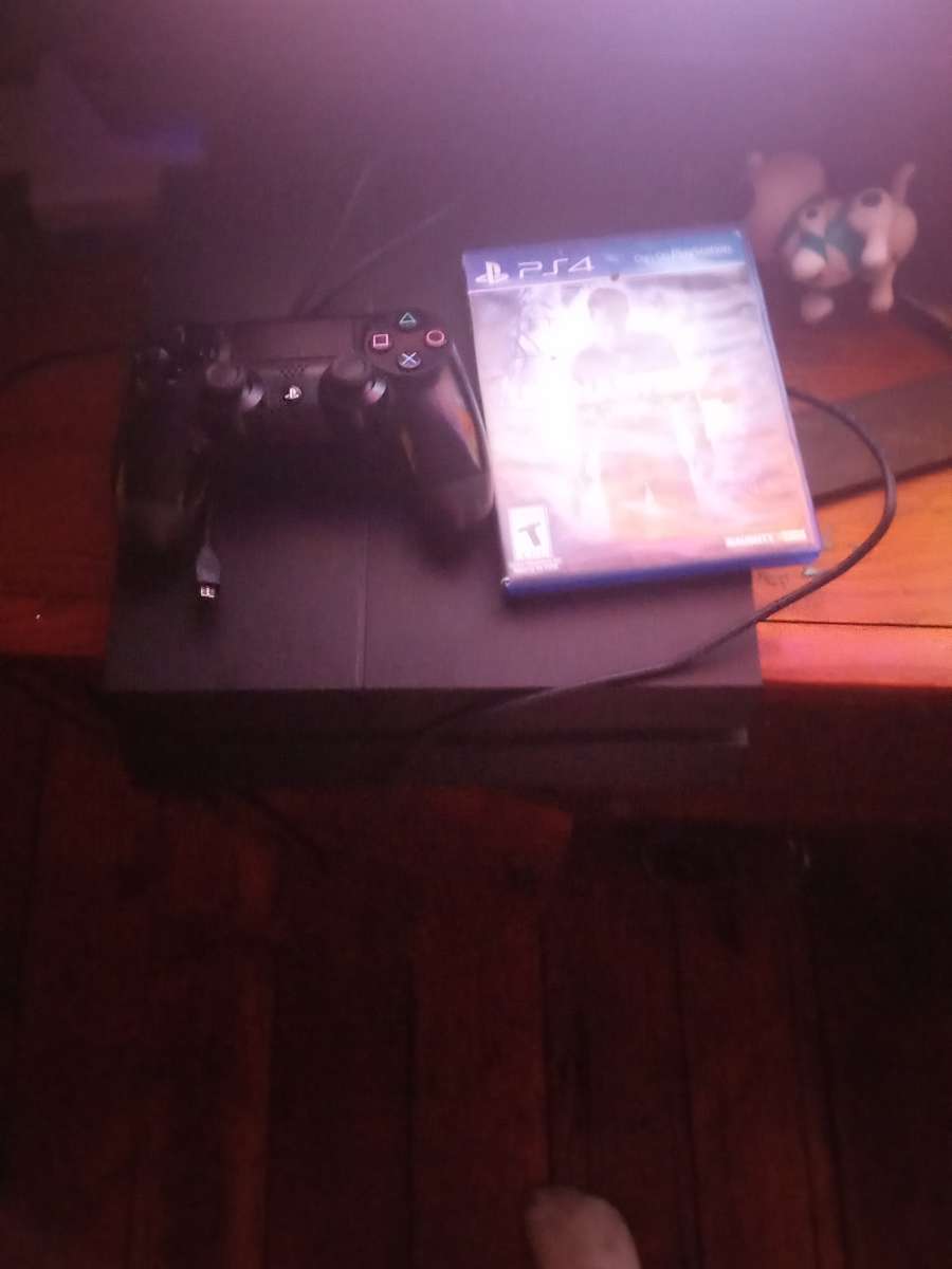 PS4 system with one game and one controller for 350