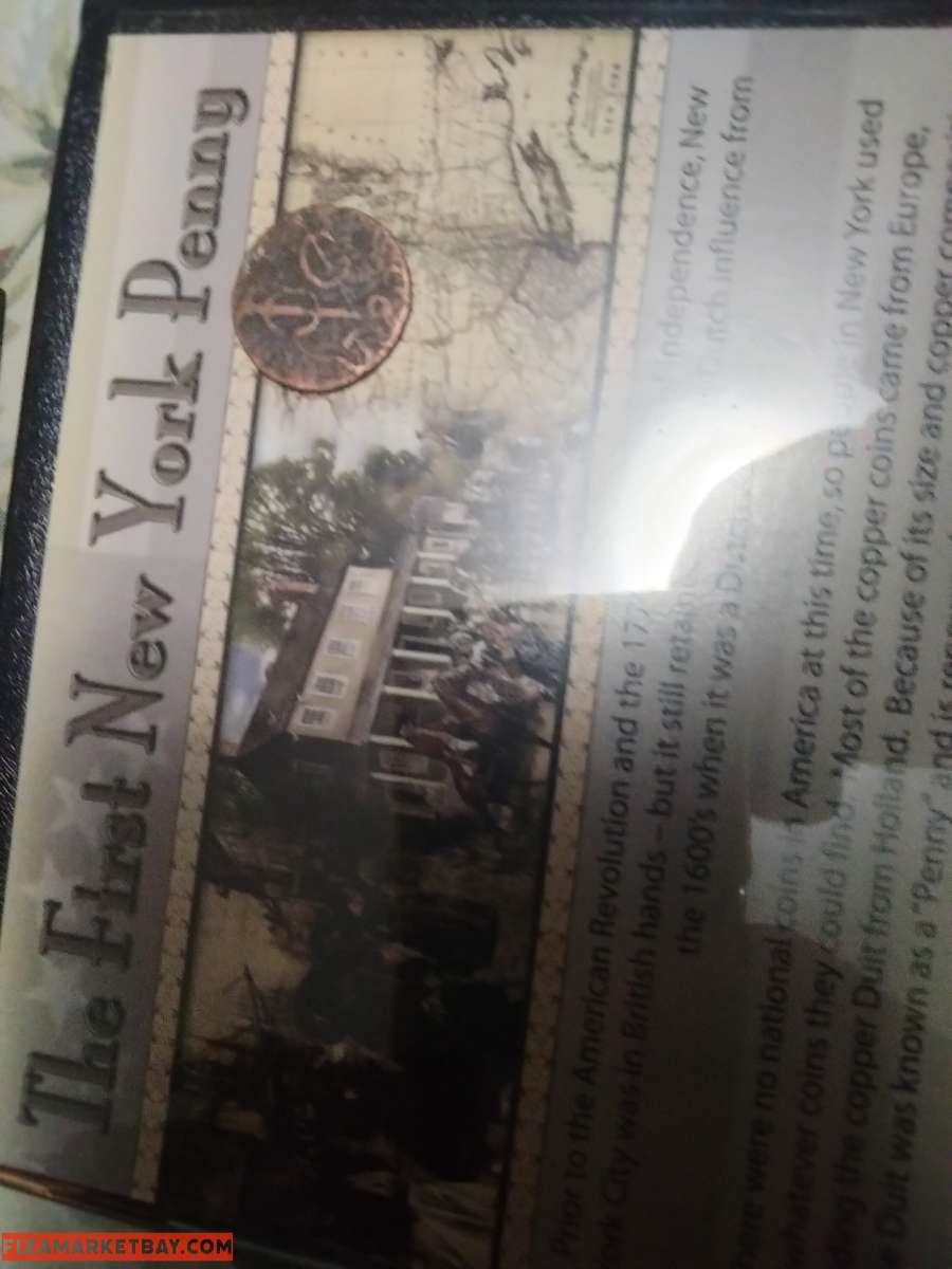 new York first penny with historical book