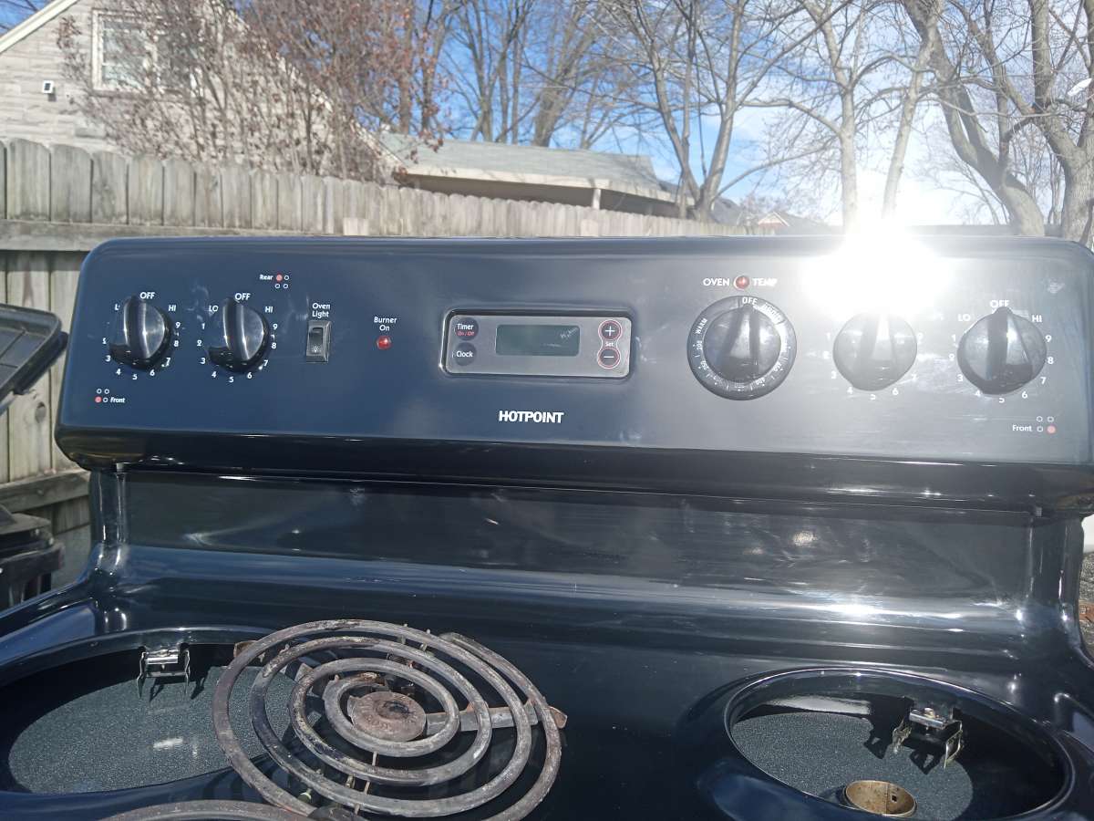 2 stoves and a refrigerator hot point is maker