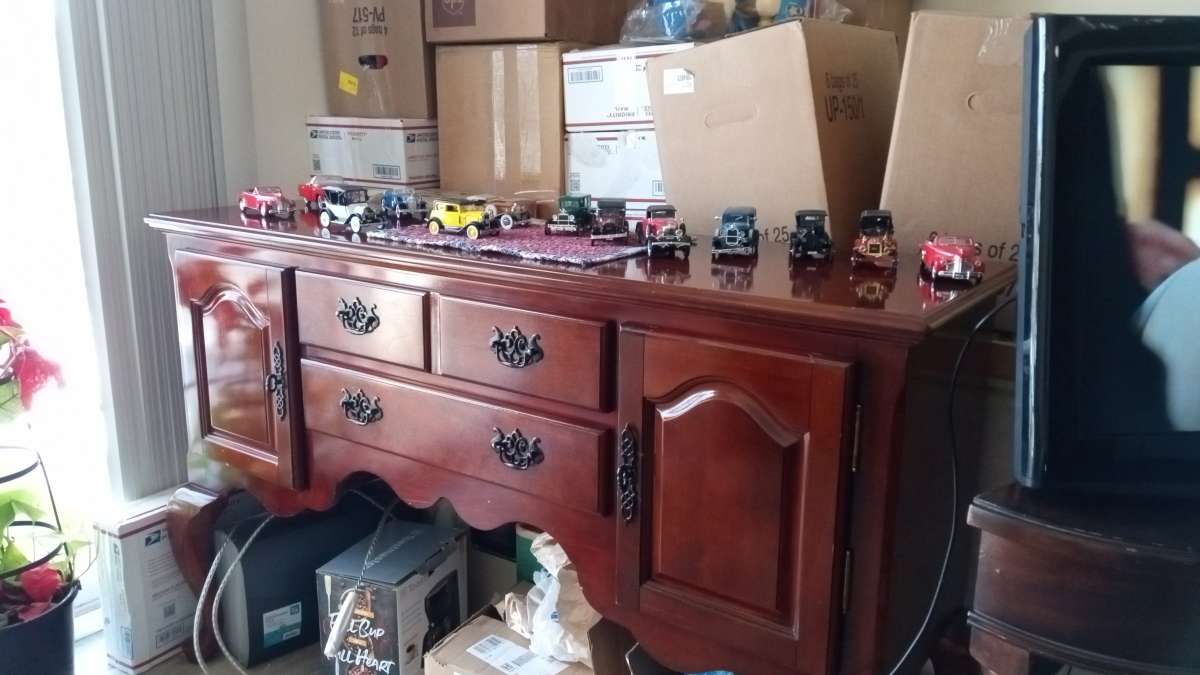 sofa and ottoman also buffet cabinet good condition as well