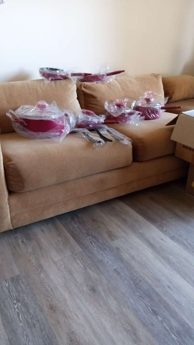 sofa and ottoman also buffet cabinet good condition as well