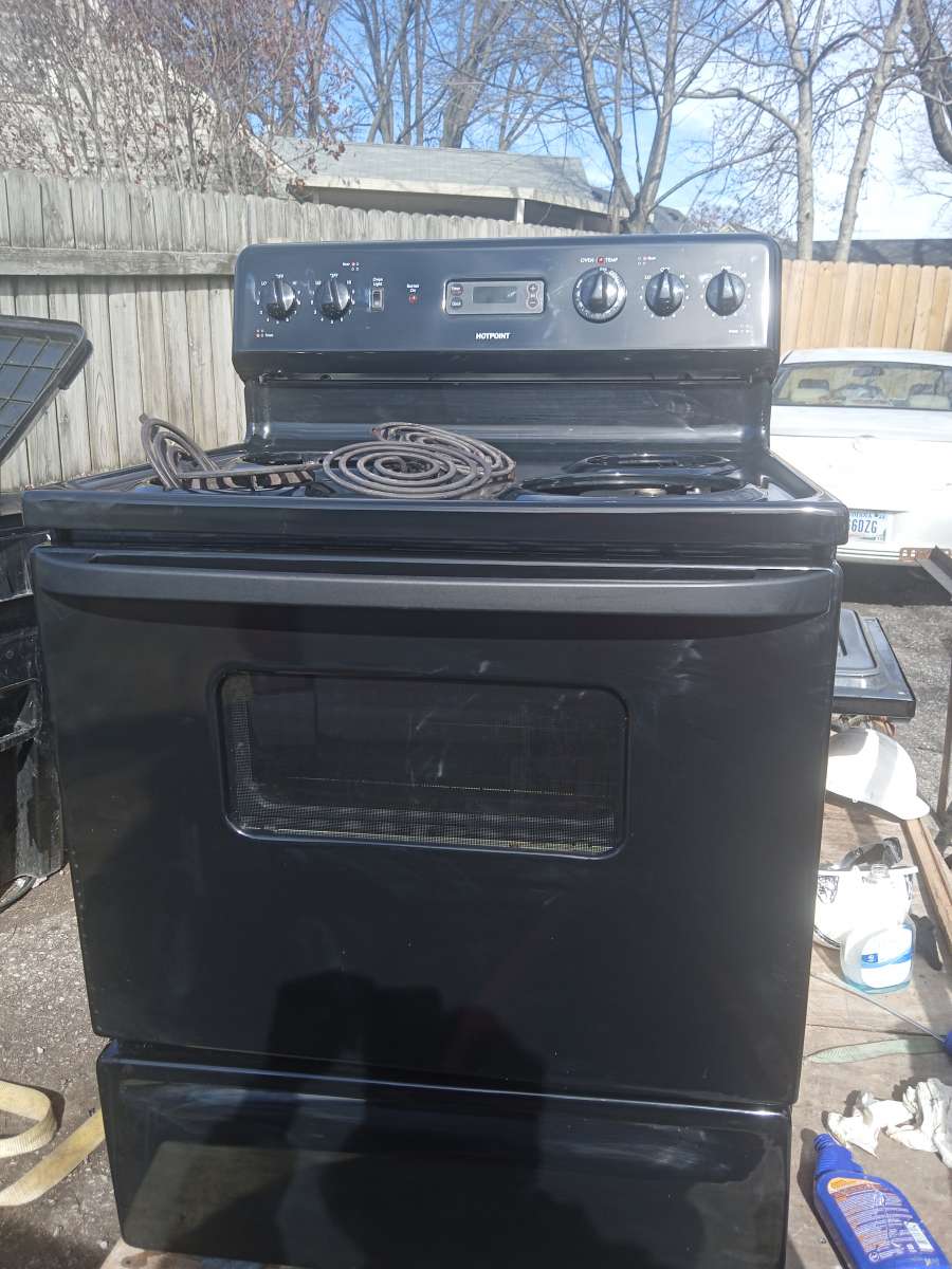 2 stoves and a refrigerator hot point is maker