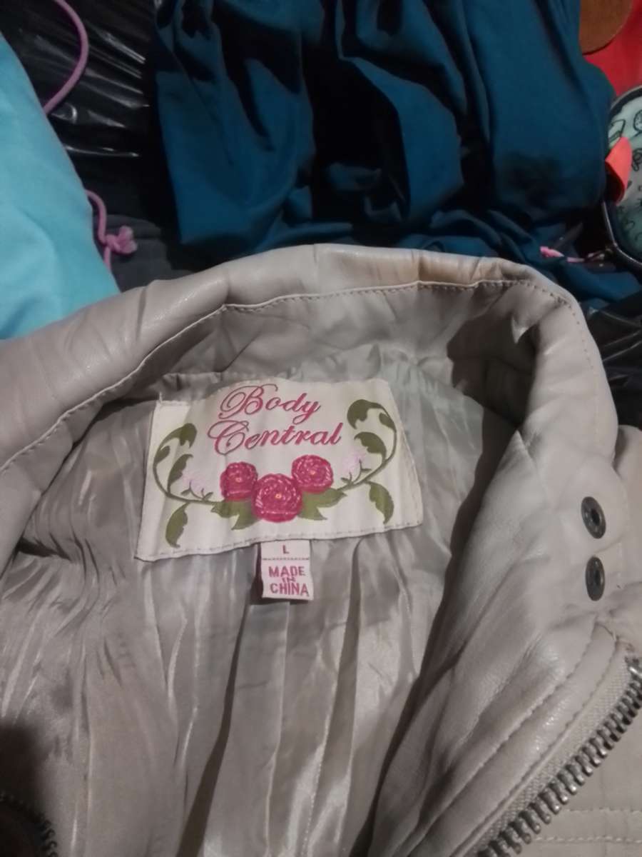 woman tan leather jacket