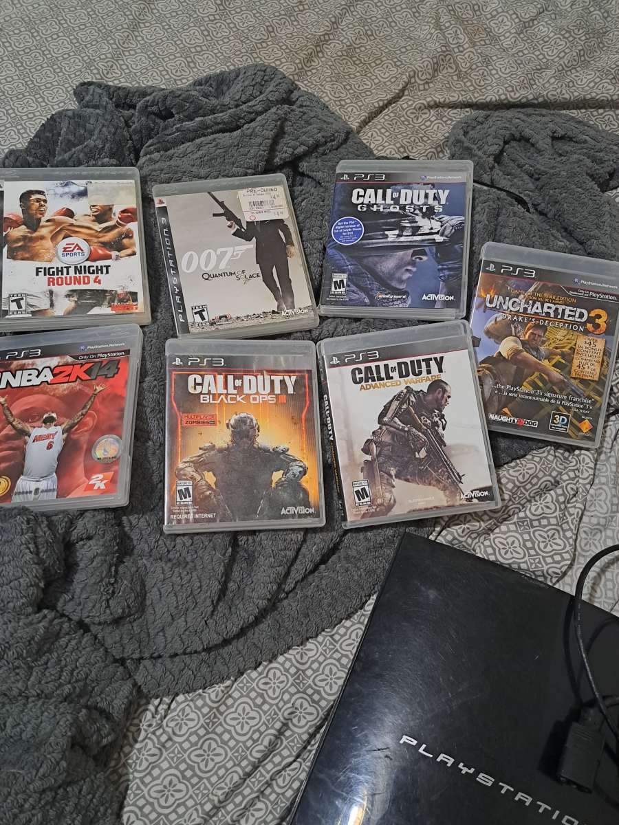 Im selling this ps3 with 7 games  without controllers