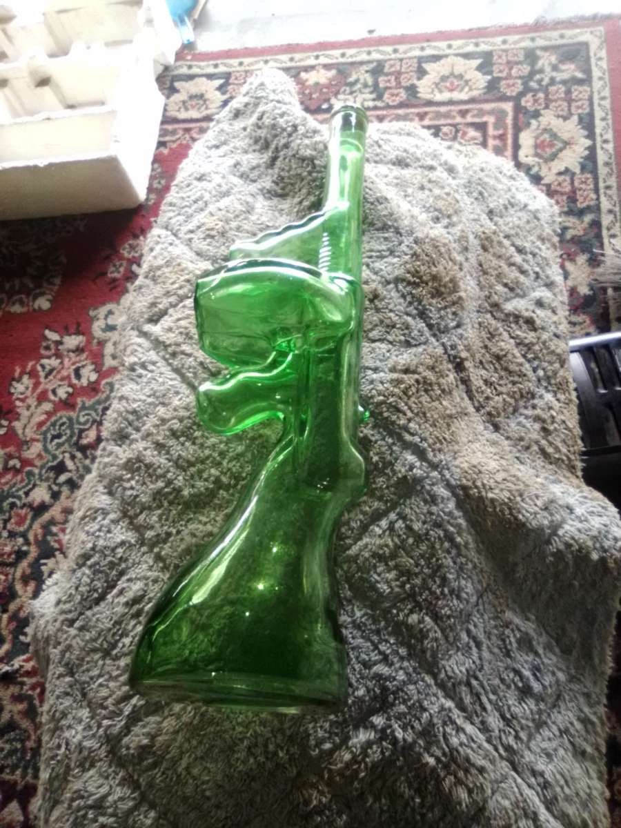 rare green glass tommy gun decanter 1920s