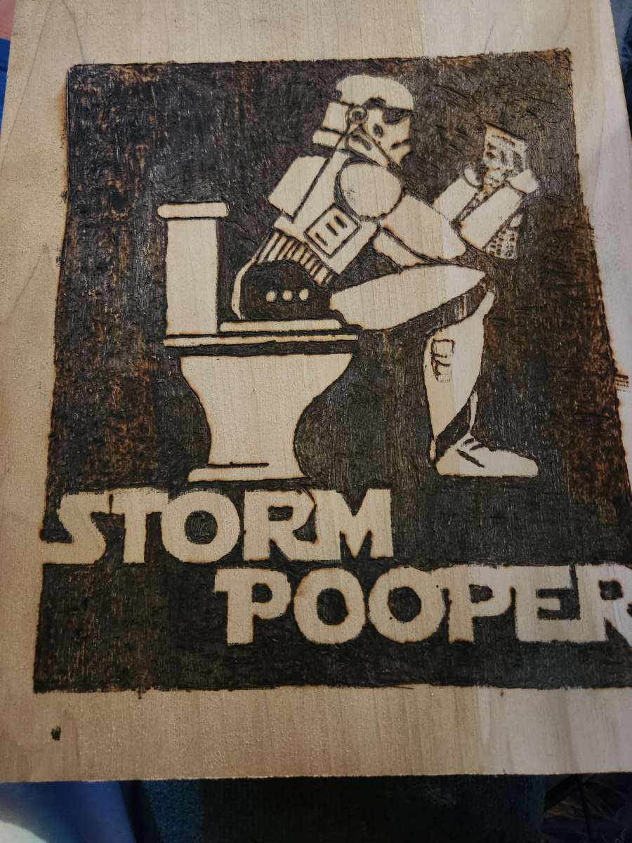 wood burning of a storm pooper