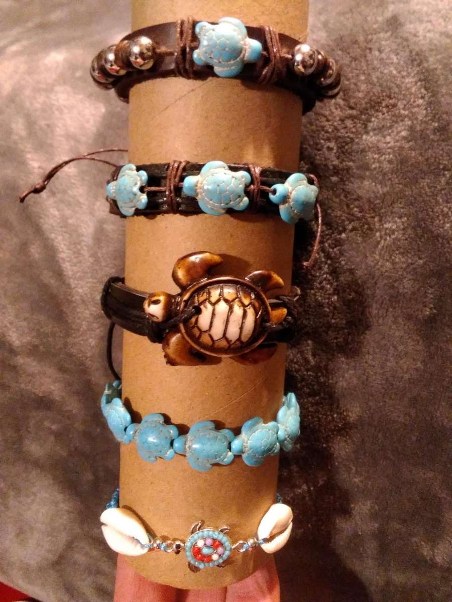 bracelets of symbolism with owls turtles and elephants
