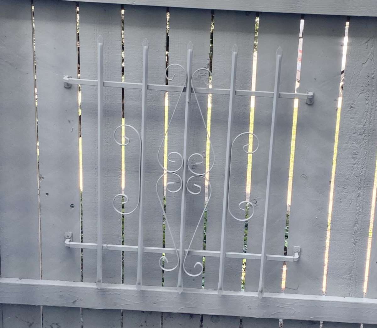 3 White rod iron gates