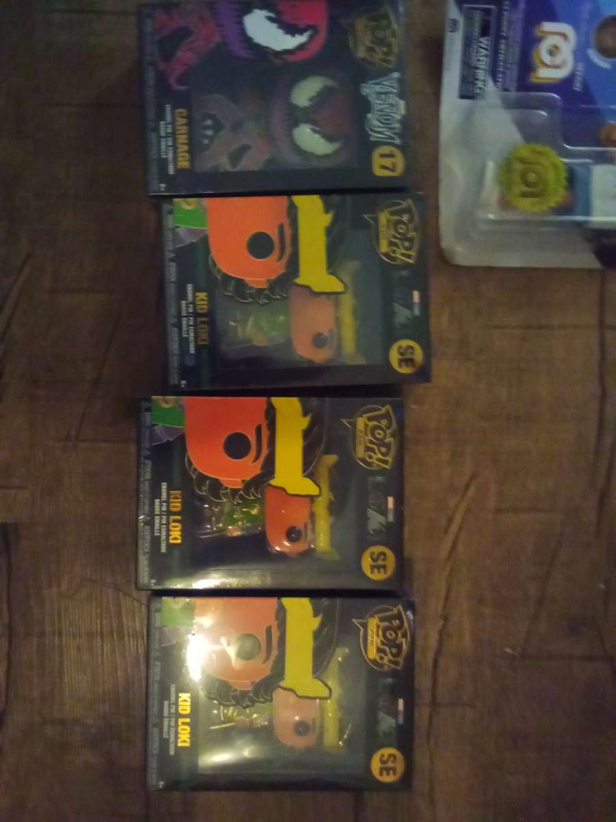 kid Loki and venom pin pop pin