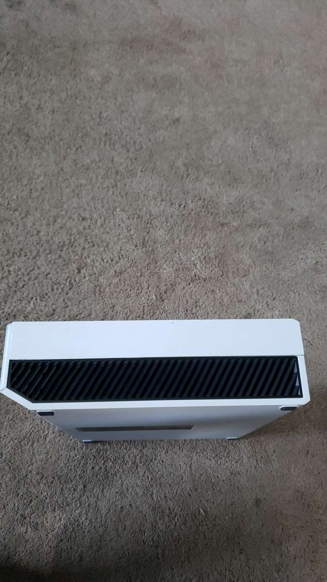 Xbox one with a wired controller and 3 games for the console