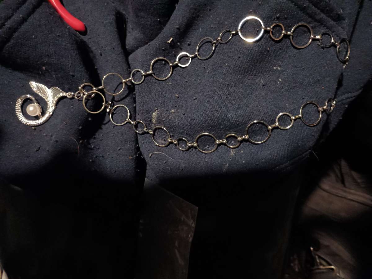 silver with a pendant and pear