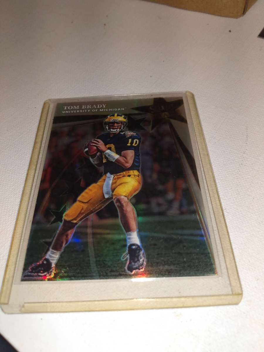 2022 select Tom Brady and his college uniform