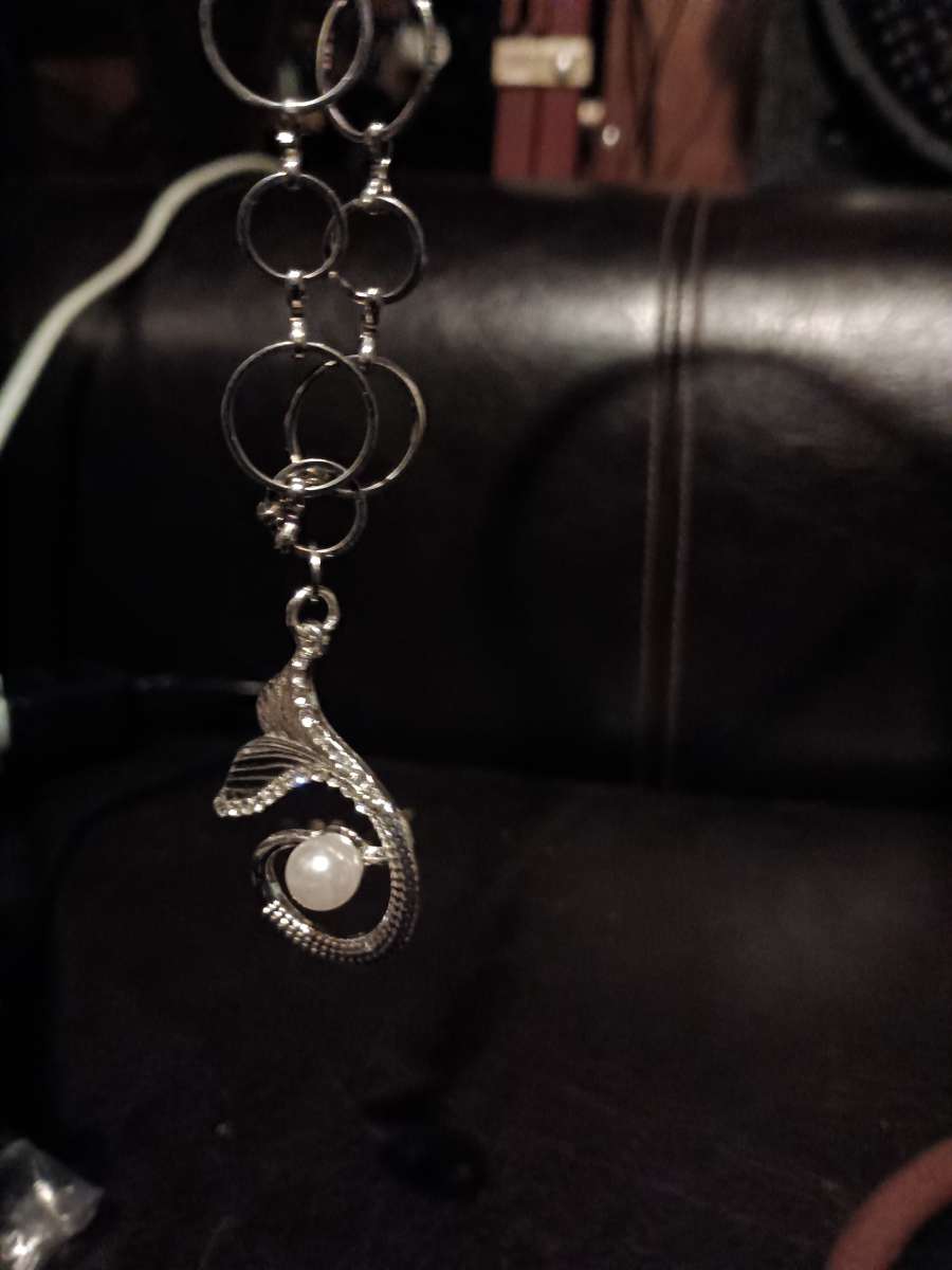 silver with a pendant and pear