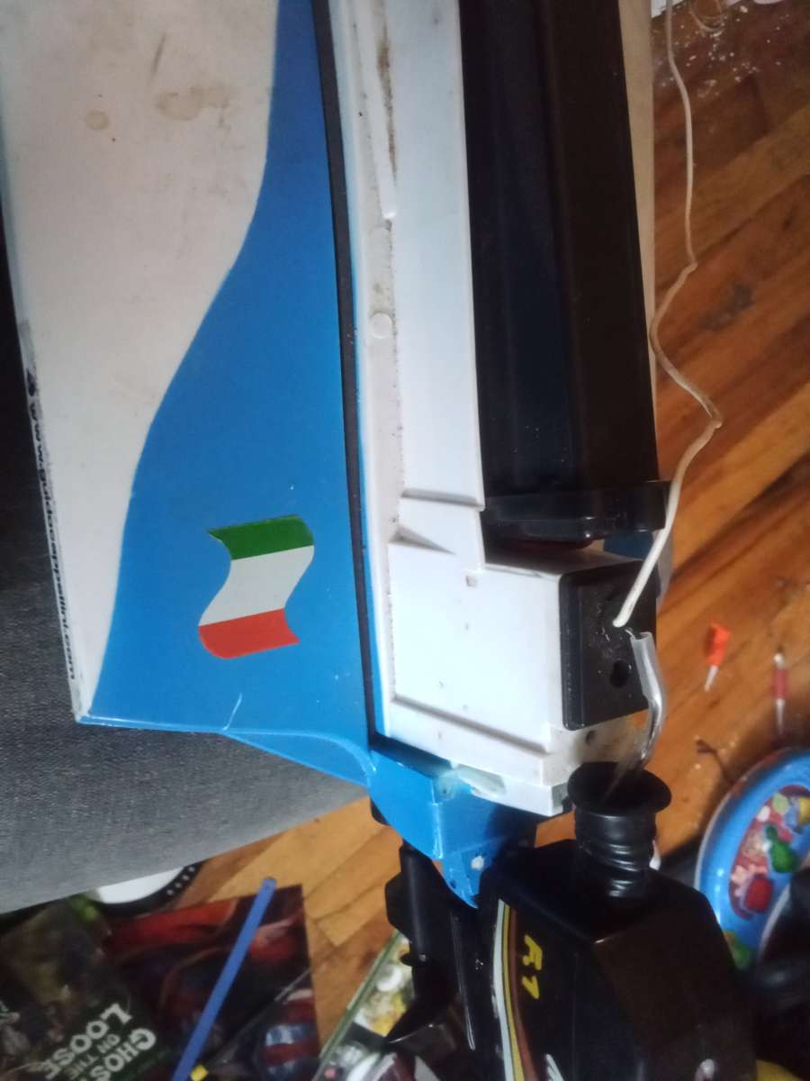 this is an old radio controlled speed boat with the battery