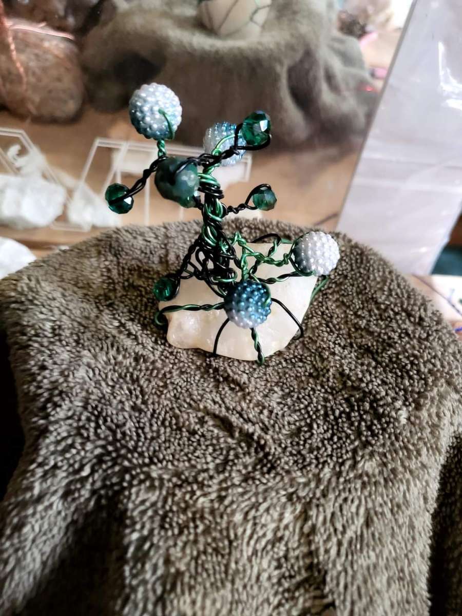 wire trees wrapped around crystal stones