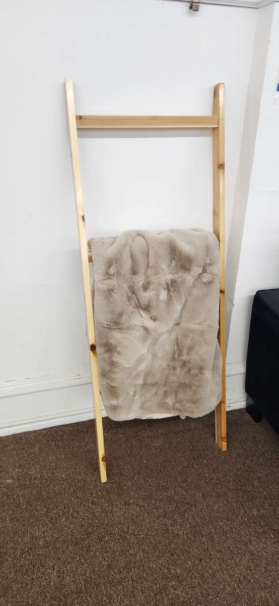 leaning blanket rack