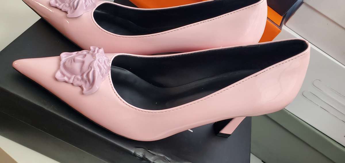 pointed Versace shoes