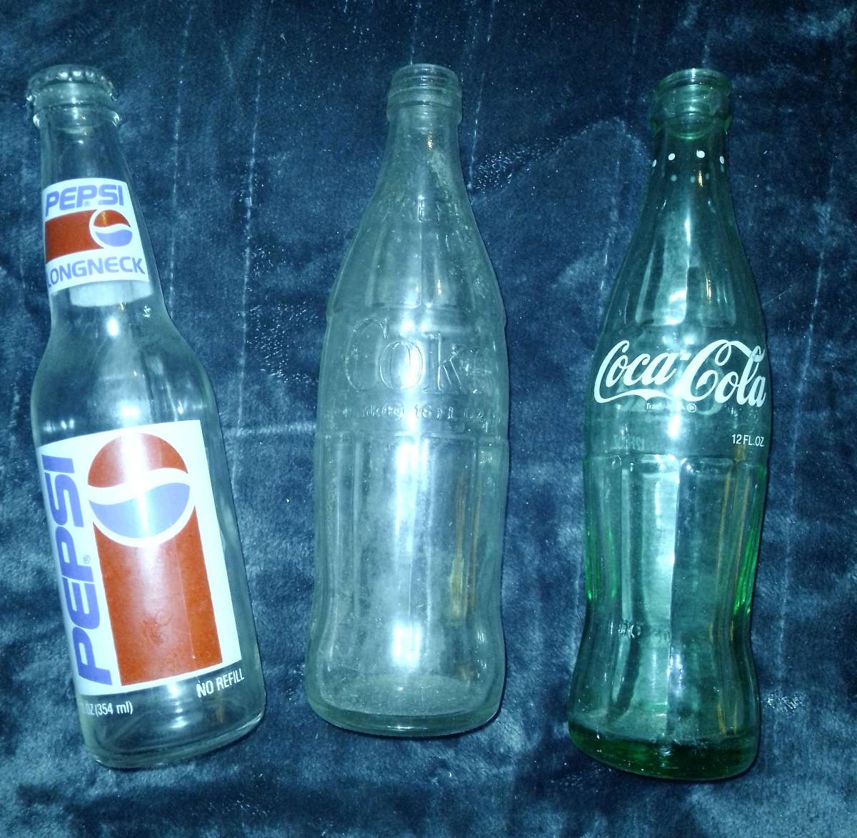 Three Empty Antique Old Bottles