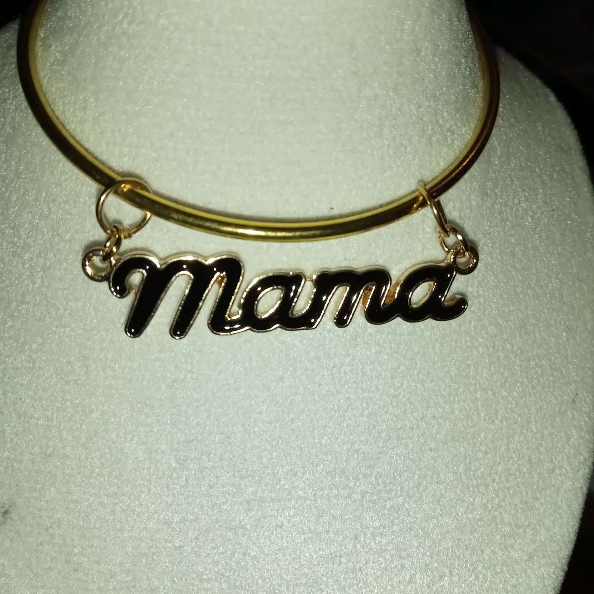 mama charm on a bangle bracelet