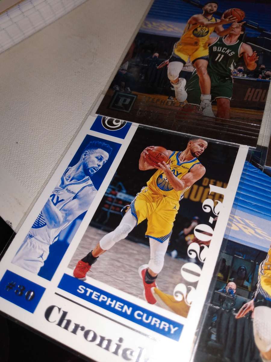 four card lot of Stephen Curry