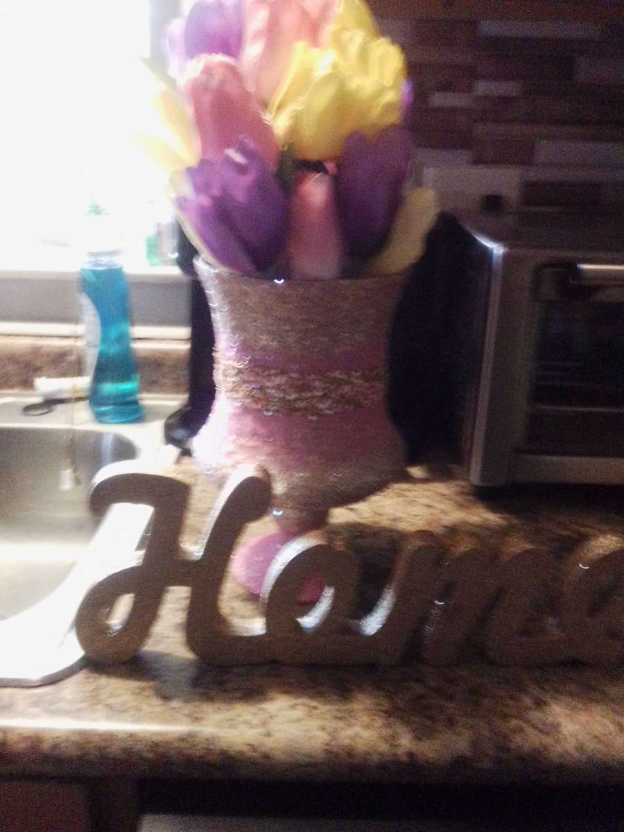 floral arrangement and home sign