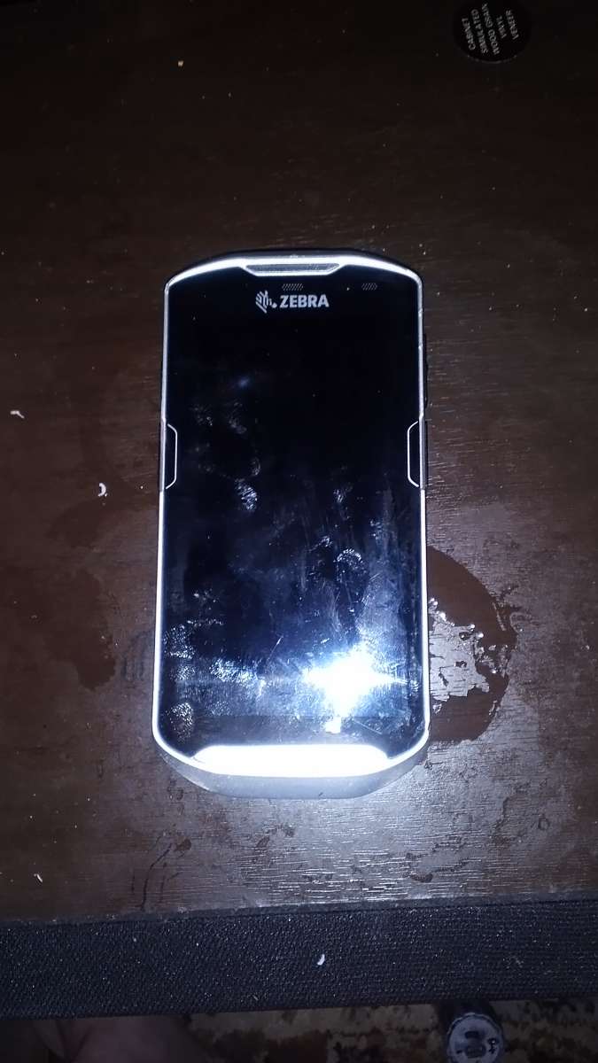 a used zebra tc560 barcode scanner