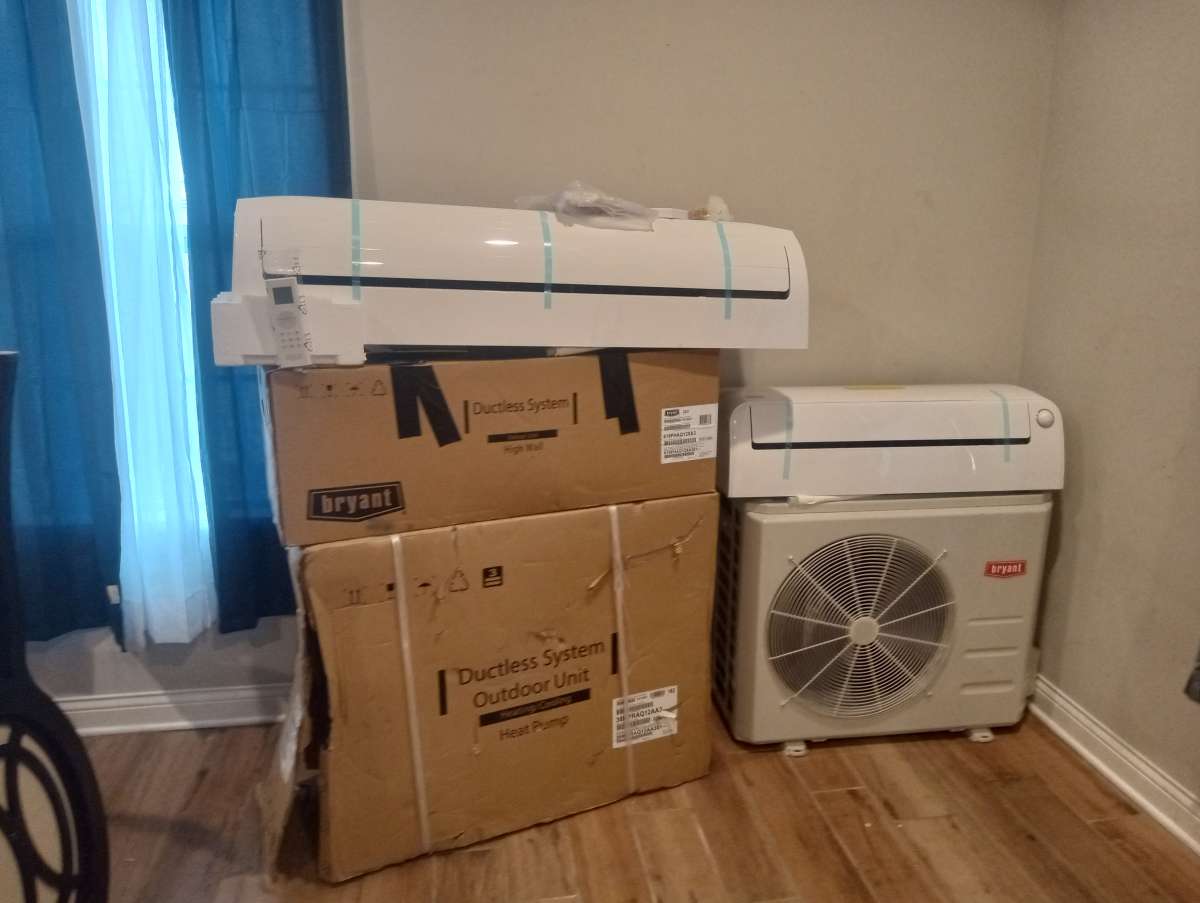 2 mini split outdoor heat pump system and 1 indoor head