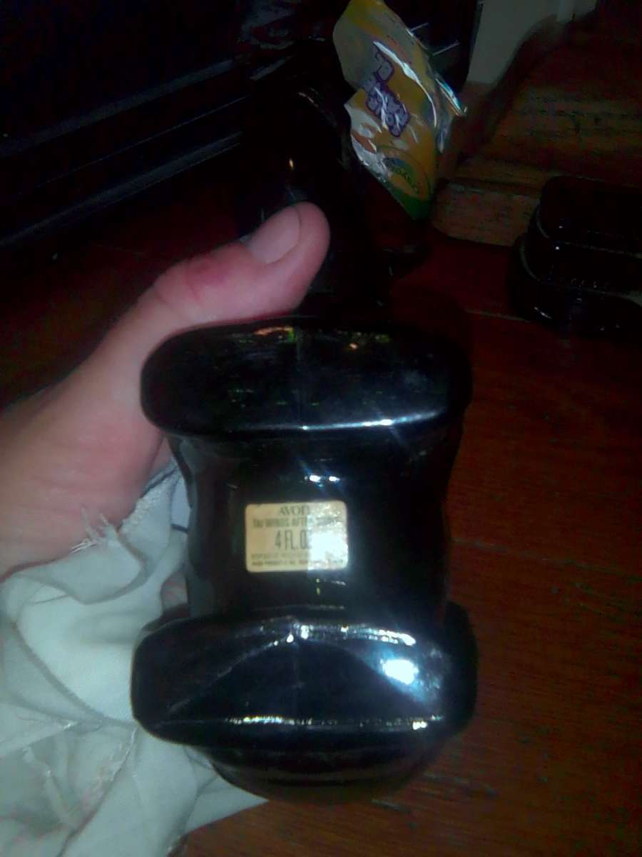 vintage rhinoceros mens cologne Avon bottle