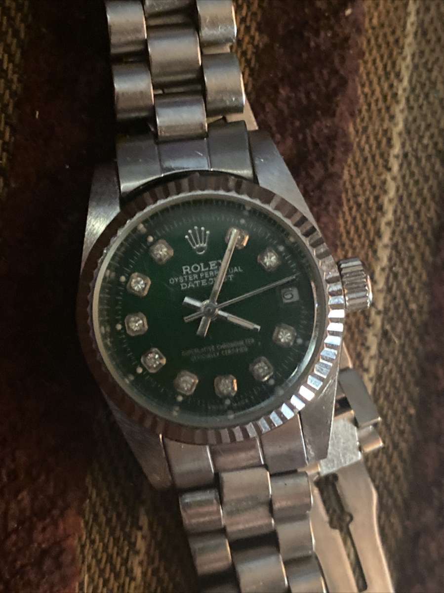 oyster perpetual datejust 18 karat white gold Rolex