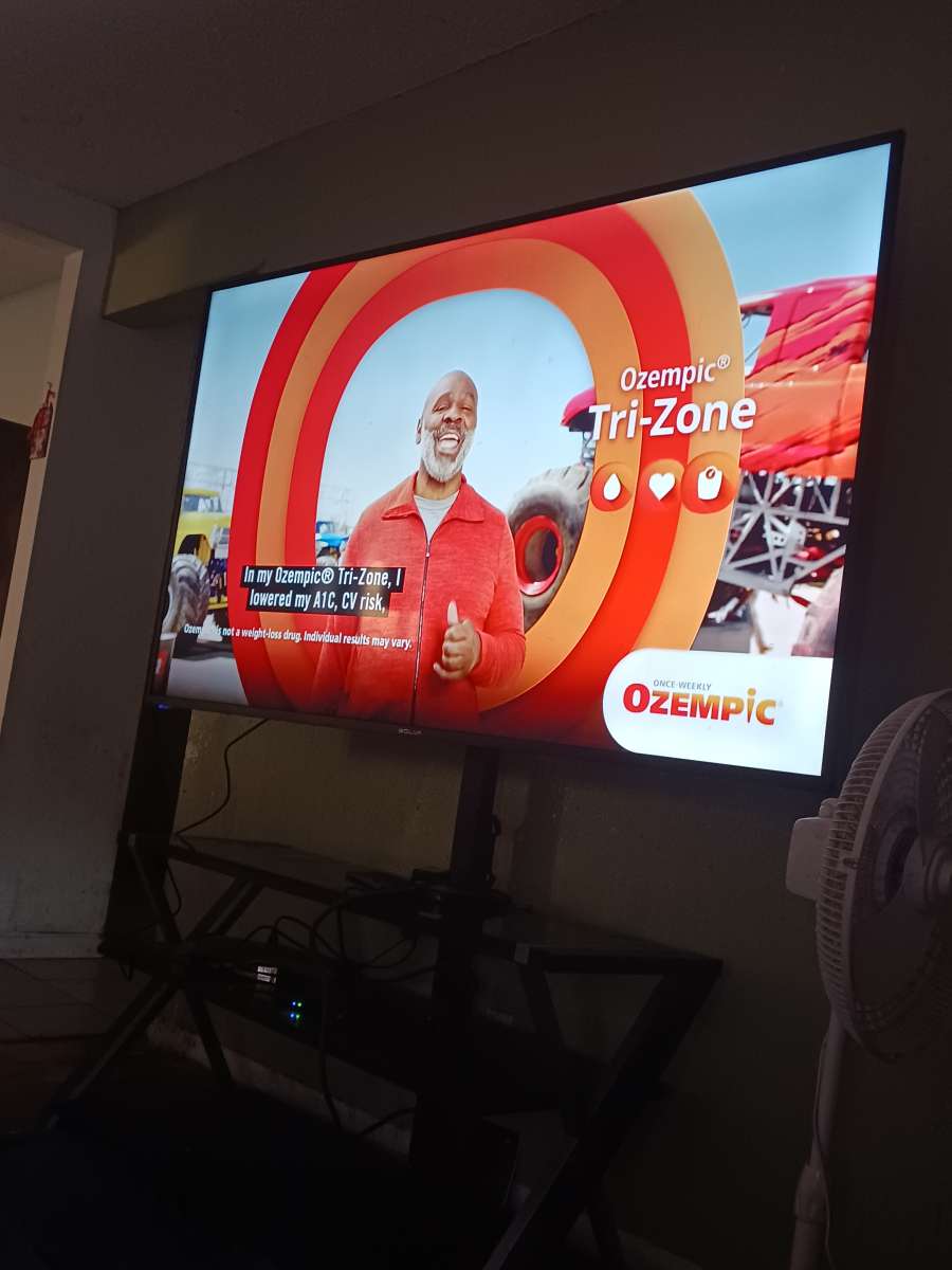 75 inch TV It Works Great Stand Included Need To Sell ASAP