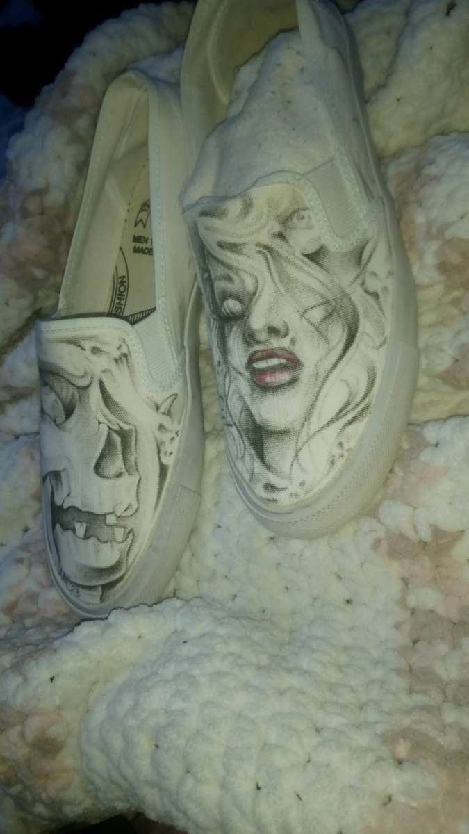 shoes with prison art drawn on them by the homeboy Jhonny m