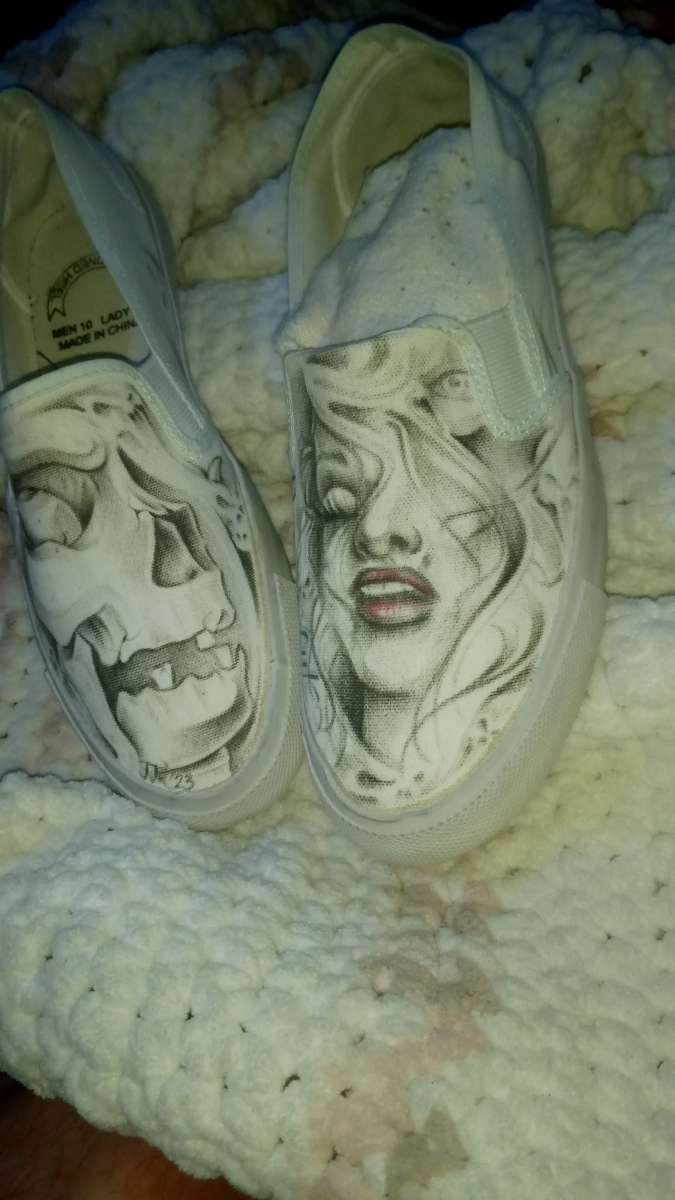 shoes with prison art drawn on them by the homeboy Jhonny m