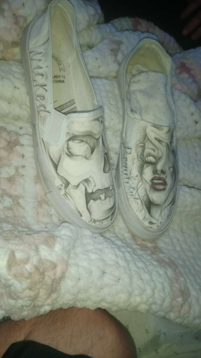 shoes with prison art drawn on them by the homeboy Jhonny m