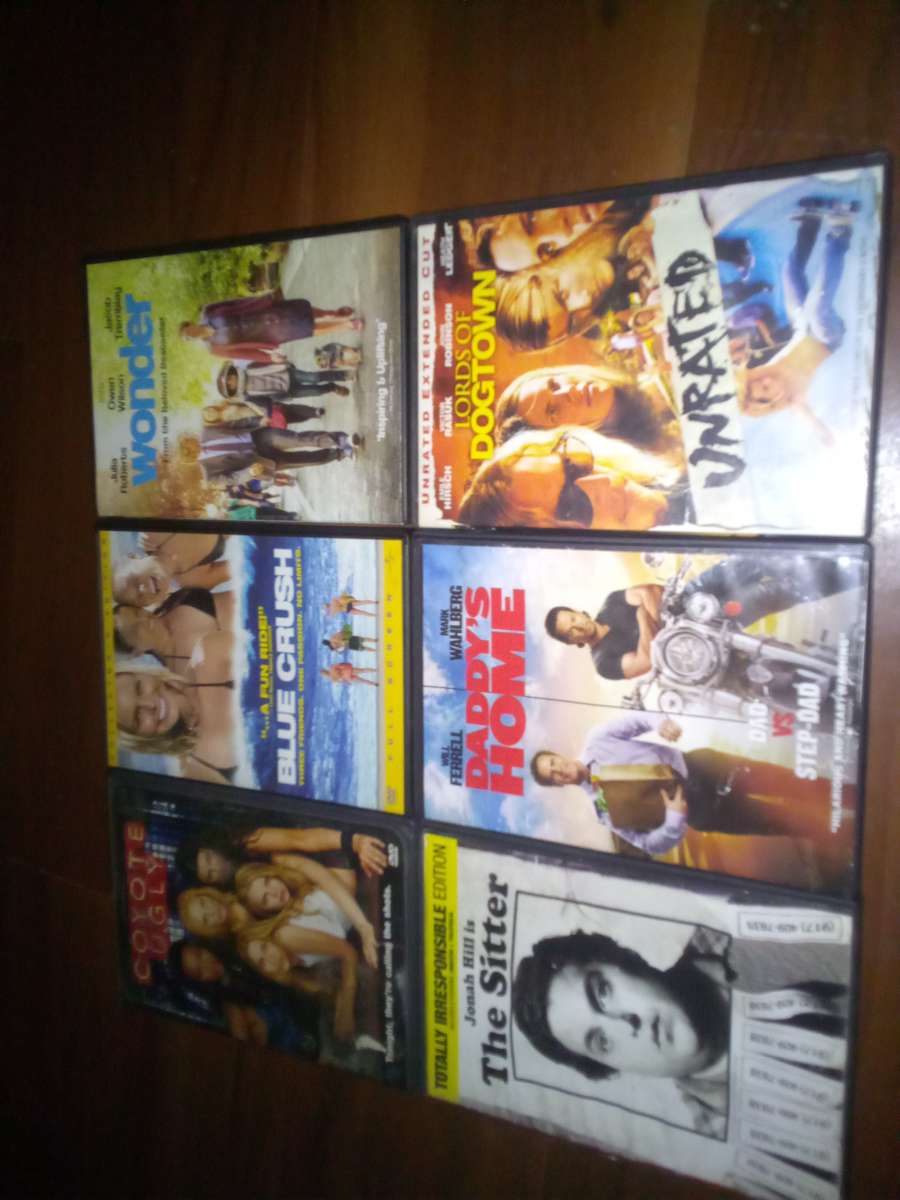 3 boxes full all types of movie genres and tv show collectio
