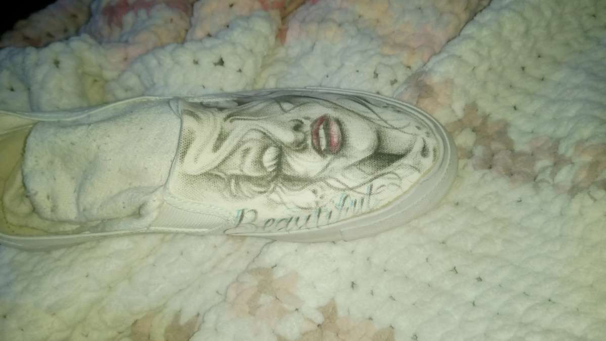 shoes with prison art drawn on them by the homeboy Jhonny m