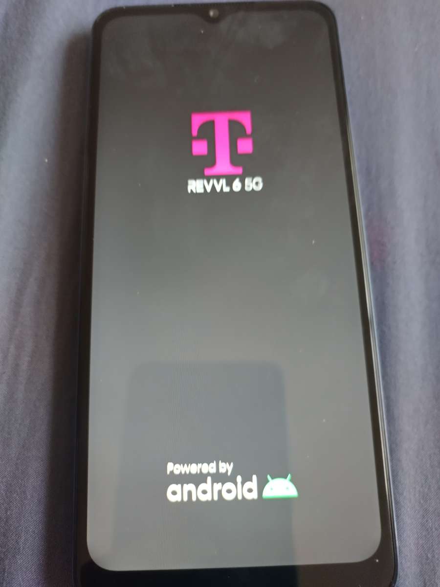 TMobile revvl 6 5G cellphone with charger cord and protector