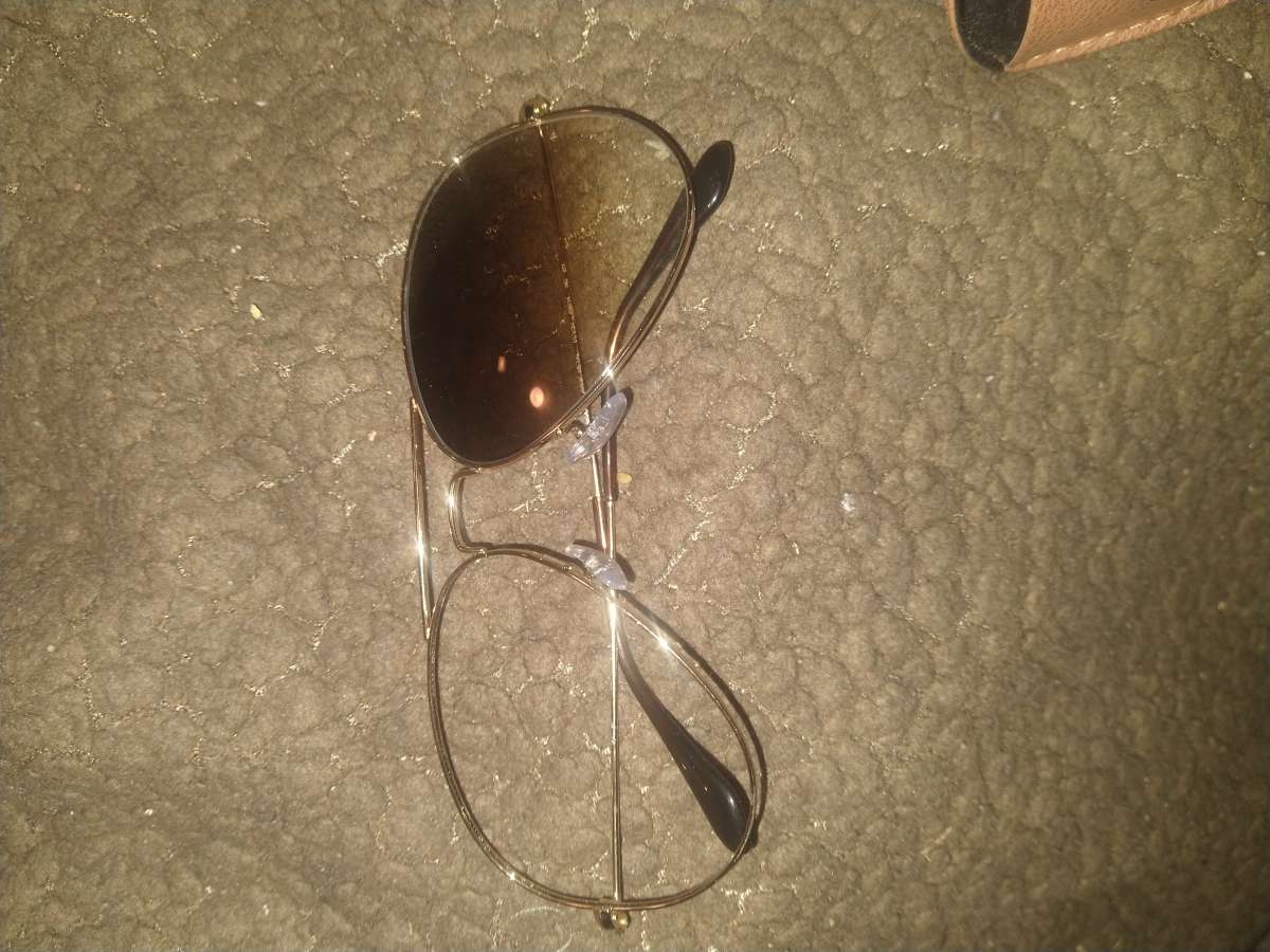 ray bans gold aviator with missing lens