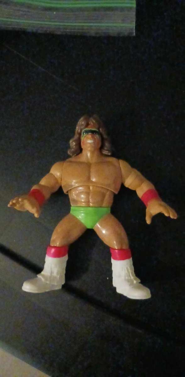 over 100 different wrestling figures