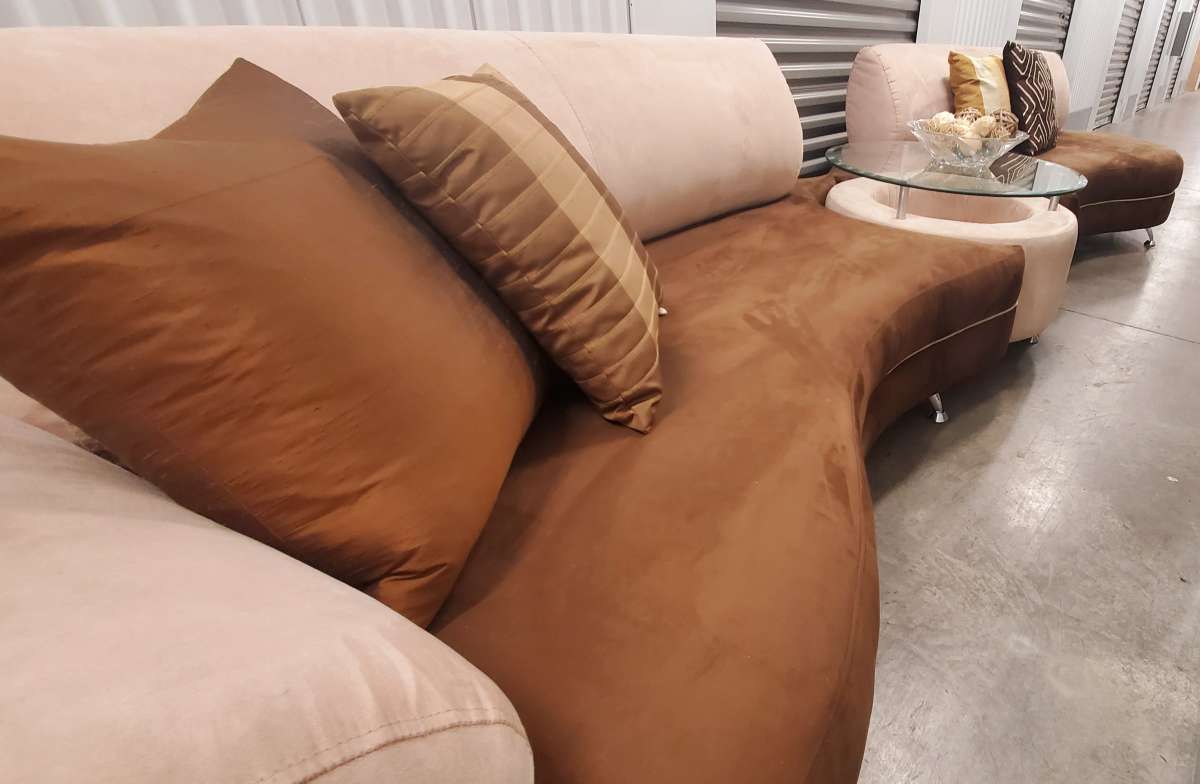 2 long curved sofas with matching table