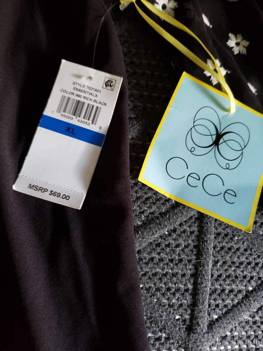 An xLarge black Short with Little White Daisys