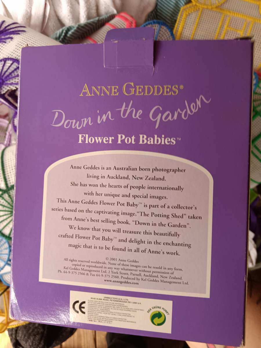 Anne geddes down in the garden flower pot baby